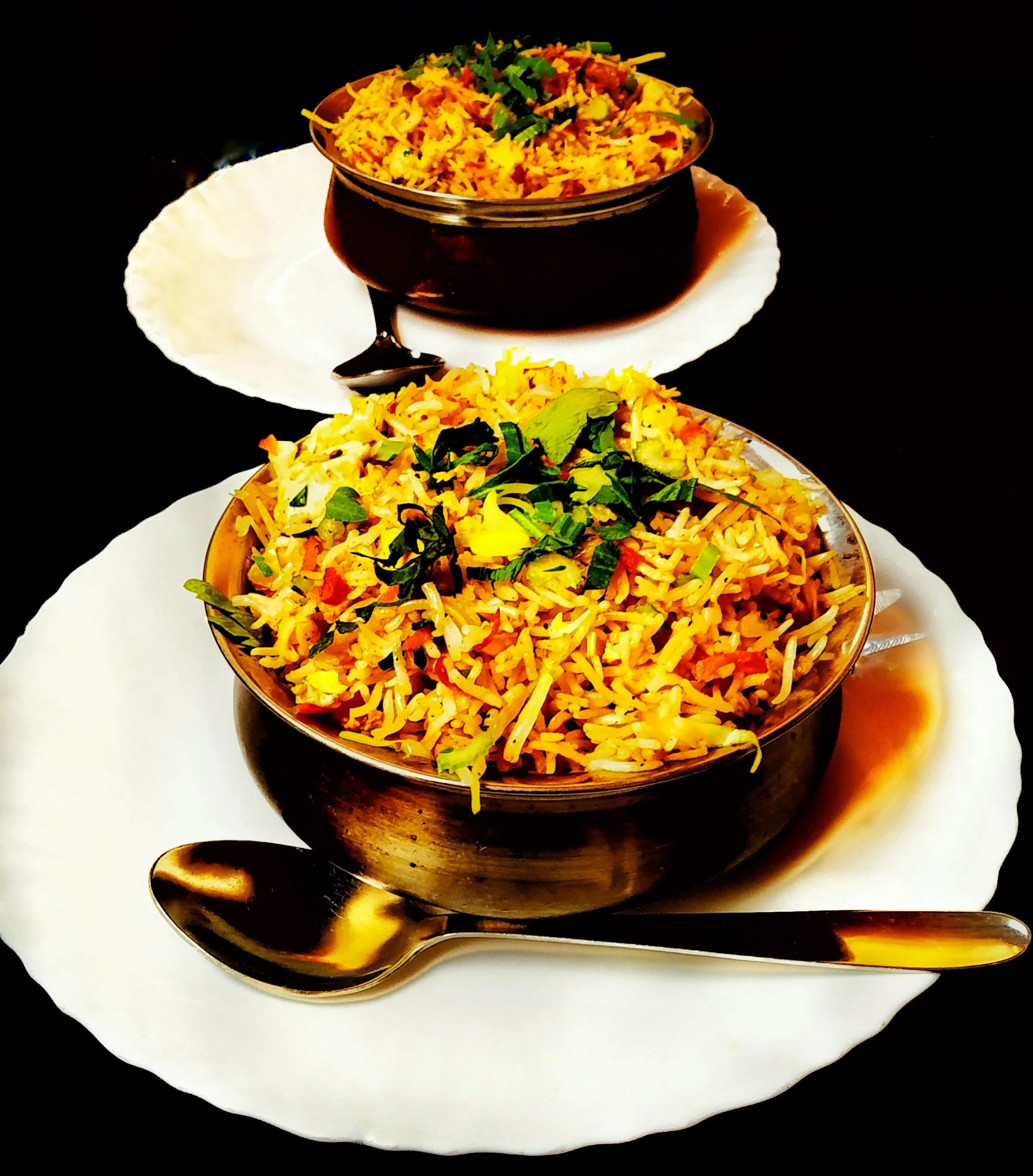 Aromatic dum biryani in a copper handi